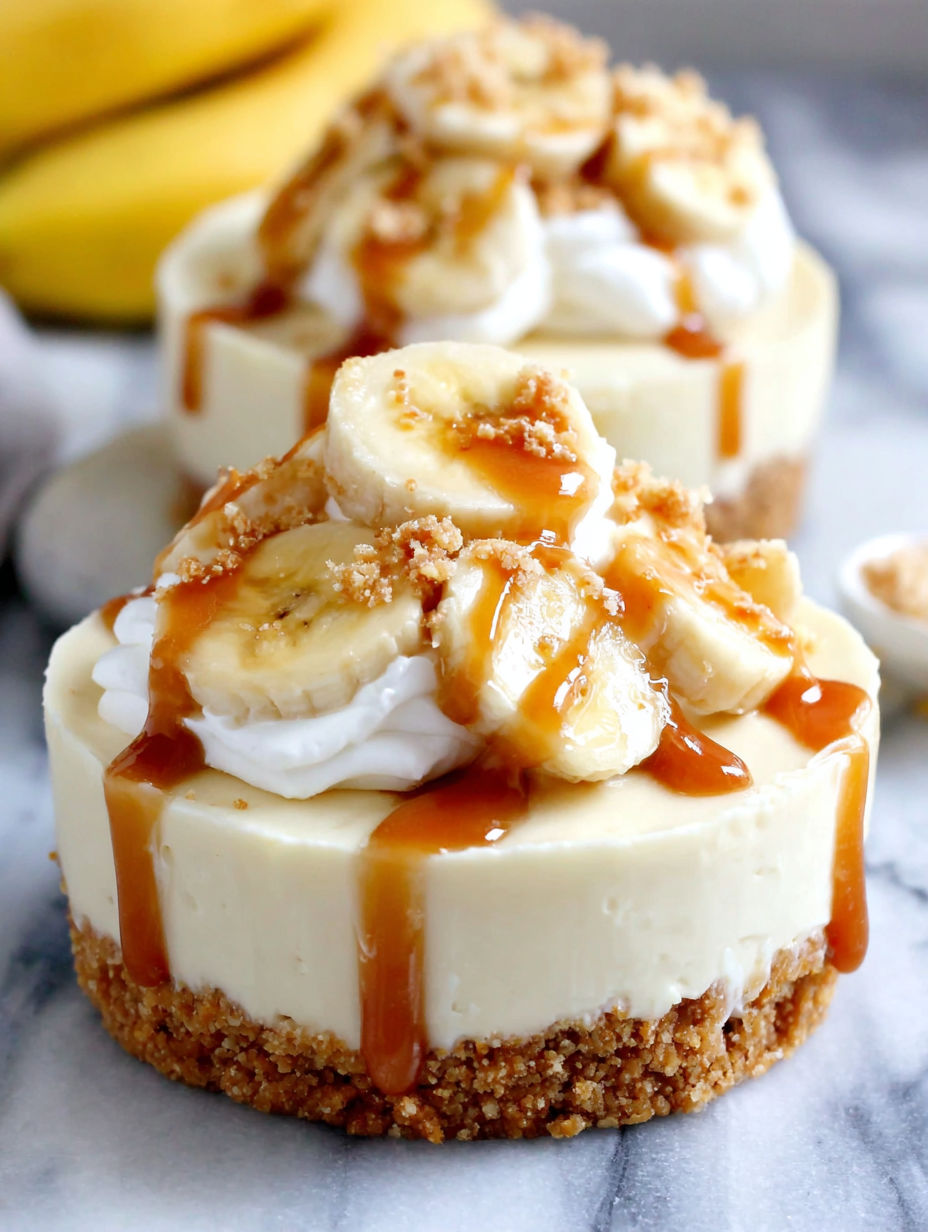 Two slices of banana cream pie with caramel drizzle.