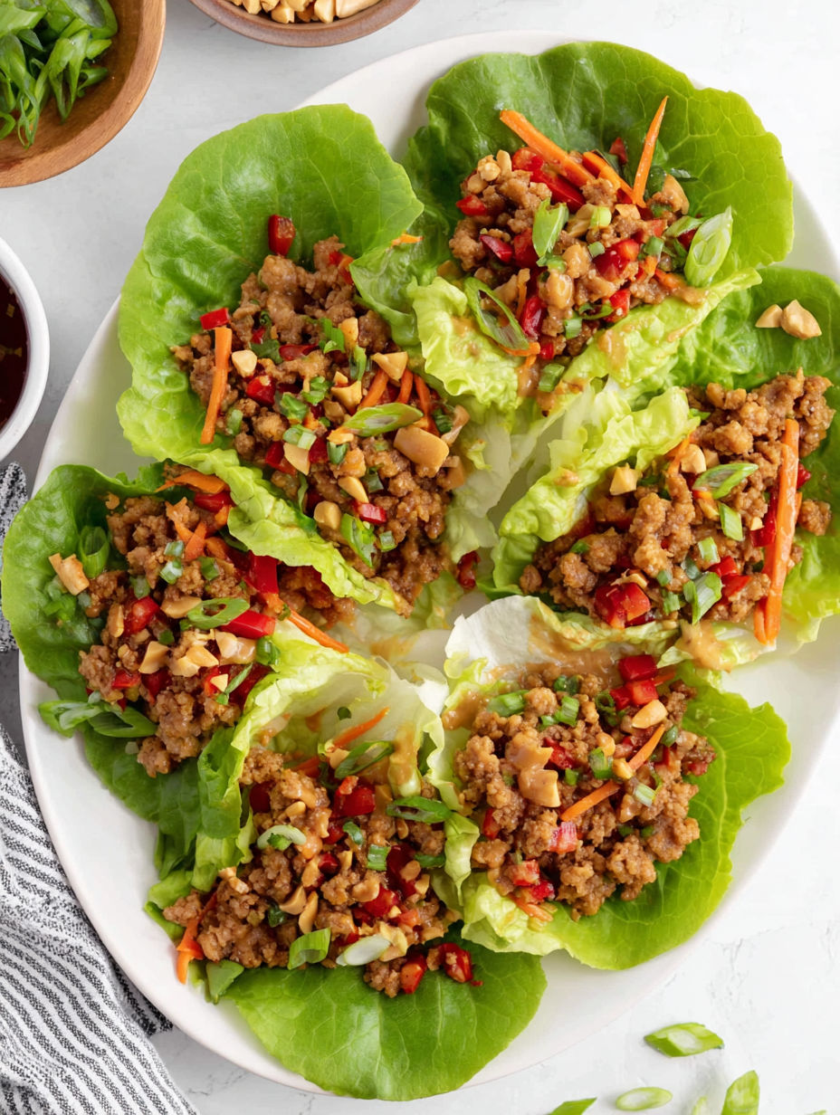 A plate of chicken lettuce wraps.