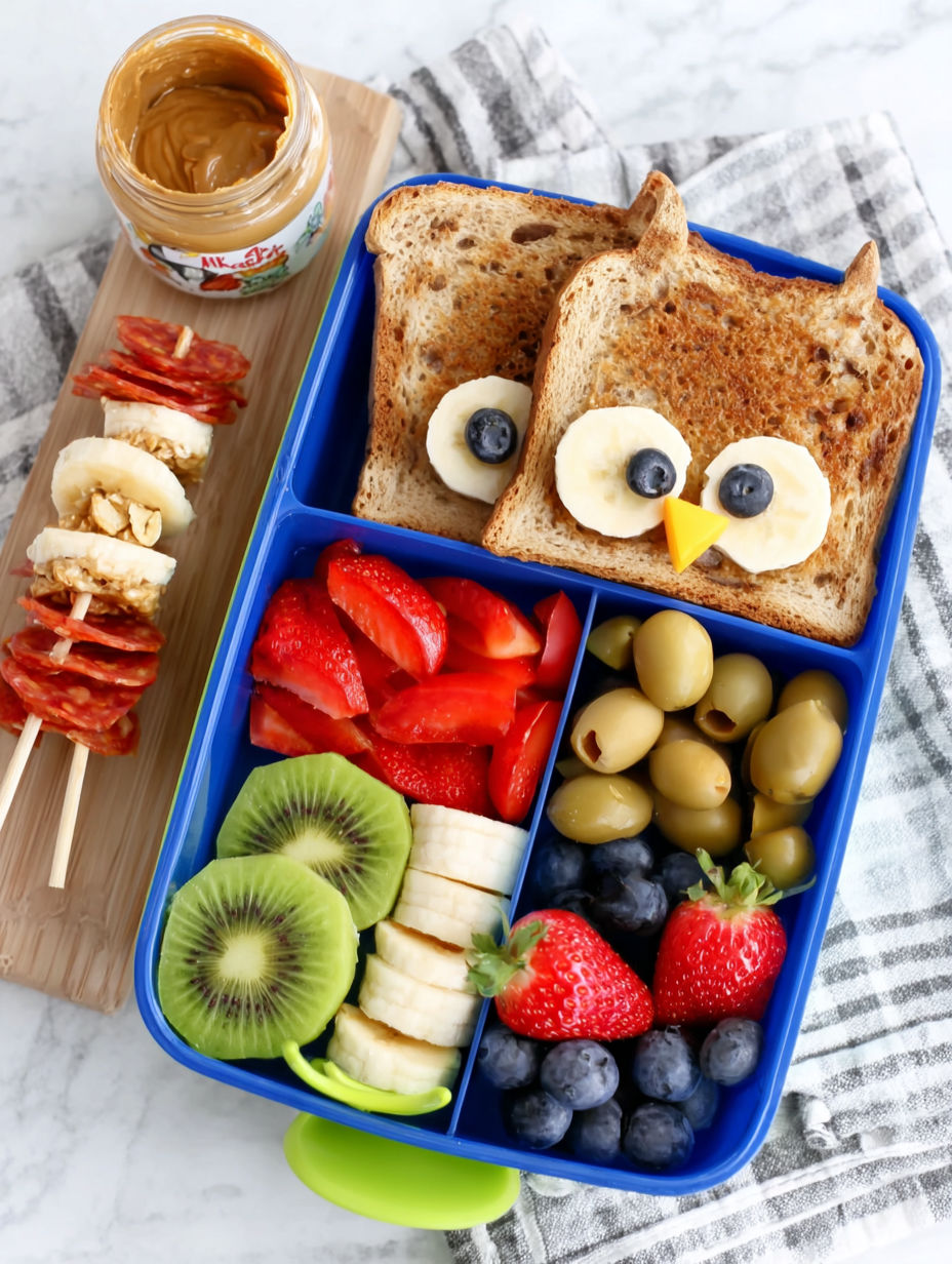 A blue tray with a variety of fruits and toast.
