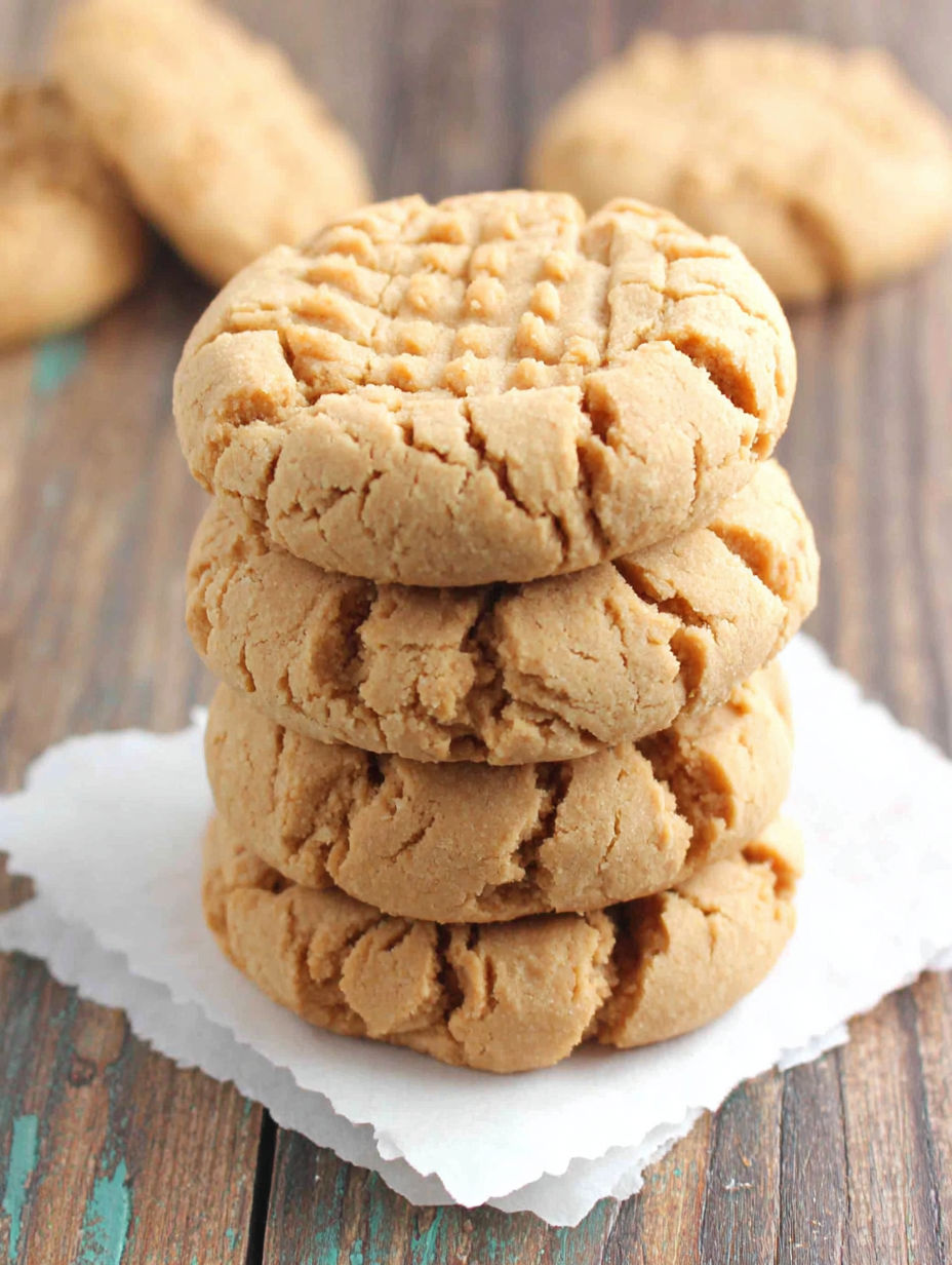 A stack of gluten free peanut butter cookies.
