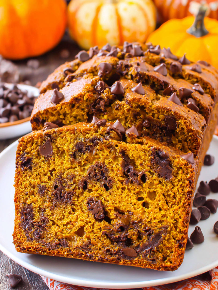 A slice of pumpkin bread with chocolate chips.