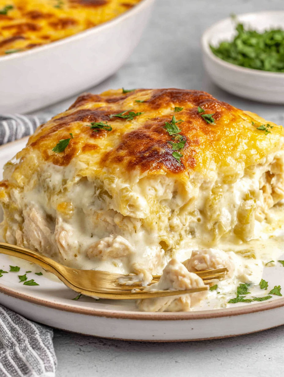 A skillet of white chicken enchiladas.