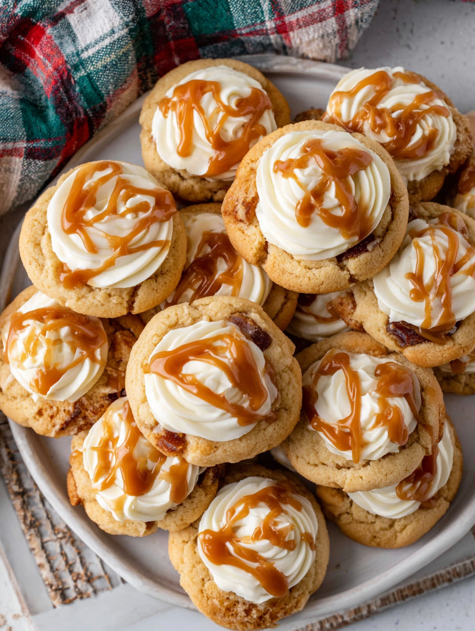 A plate of cookies with caramel drizzle.