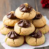 A stack of peanut butter blossom cookies.