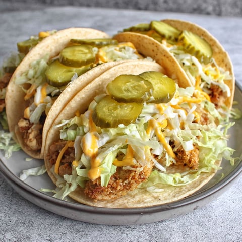 A plate of chicken big mac taco.