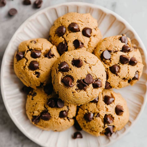 A plate of chocolate chip cookies.
