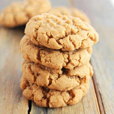 A stack of gluten free peanut butter cookies.